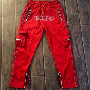 Size:small Color:red “Oversized” in the front in rhinestones